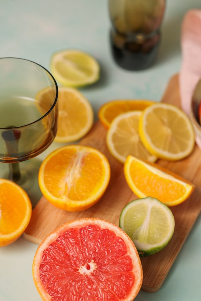 Photo by Yann Khatchadourian grapefruit, lime, and orange slices on a cutting board