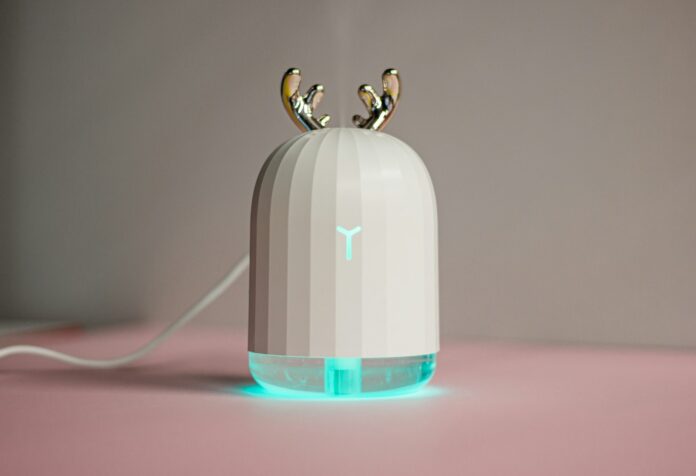 Photo by Ulla Shinami an electronic device with two birds on top of it